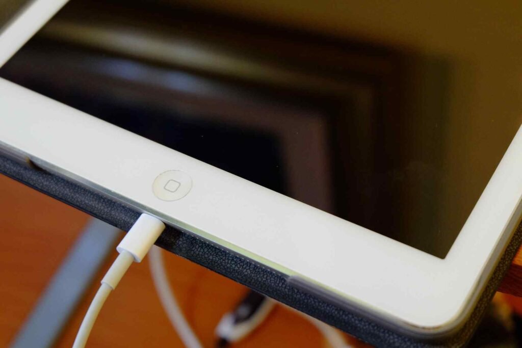 An ipad getting charged by usb c.