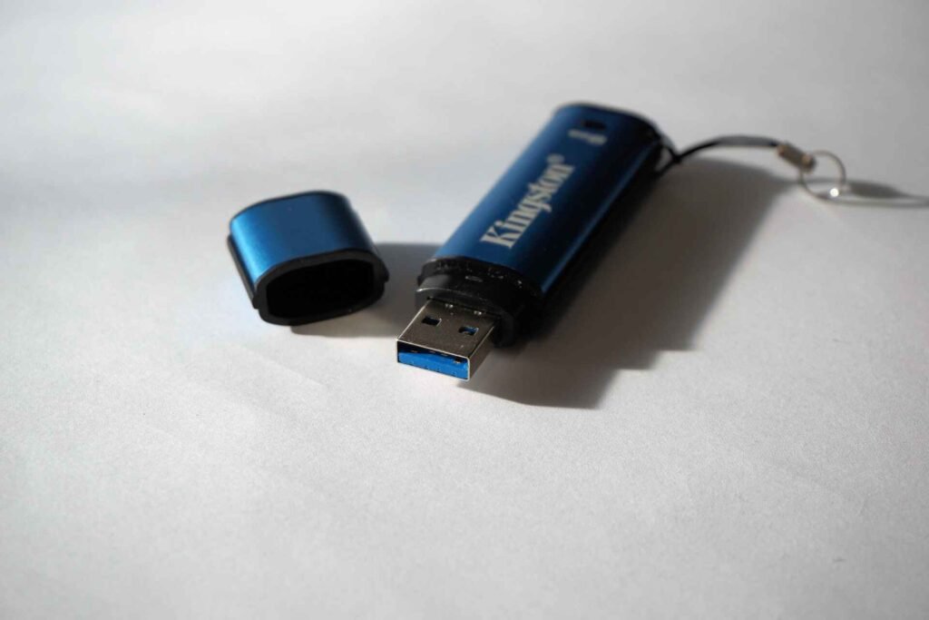 A usb stick with a blue usb 3.0 connection.