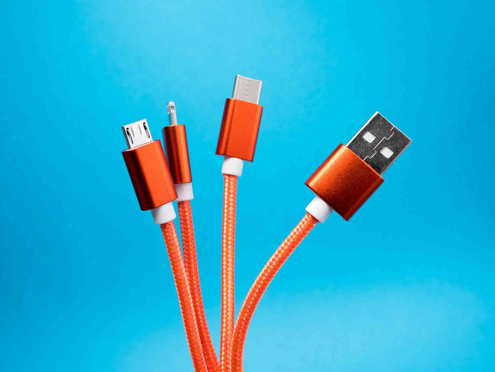 4 red usb cables with different types of usb connections.