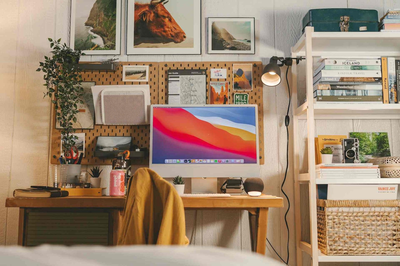 An usb powered desk light hanging over a work space.