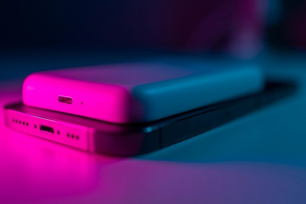A power bank lying on a phone.