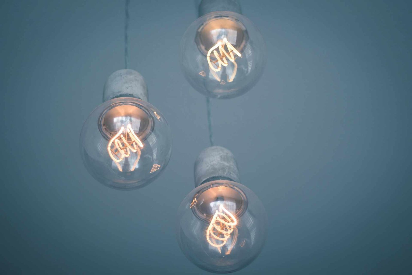 Three LED pendant lamps hanging down from the ceiling.