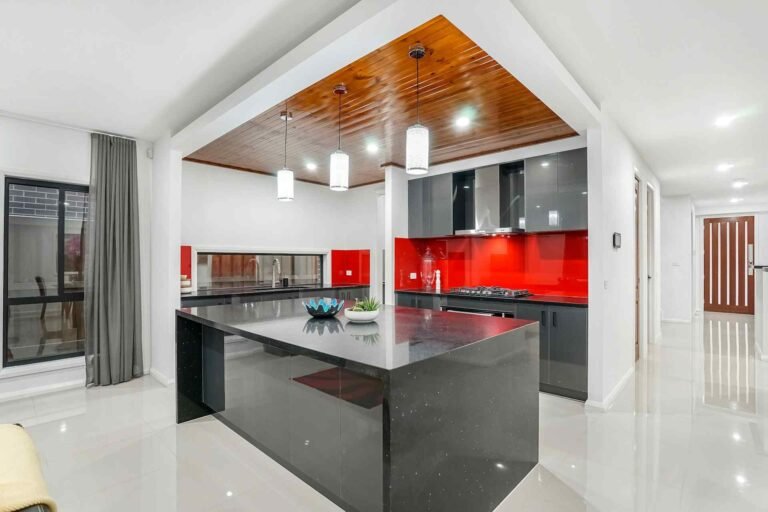 A kitchen with very bright cool natural lighting.