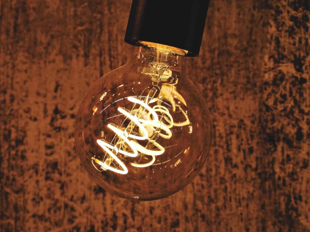 A clear close up of an LED bulb with warm light.