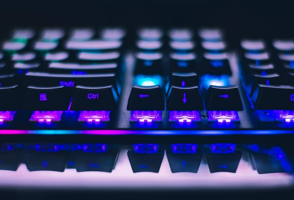 A high mechanical keyboard profile with rgb from the side.