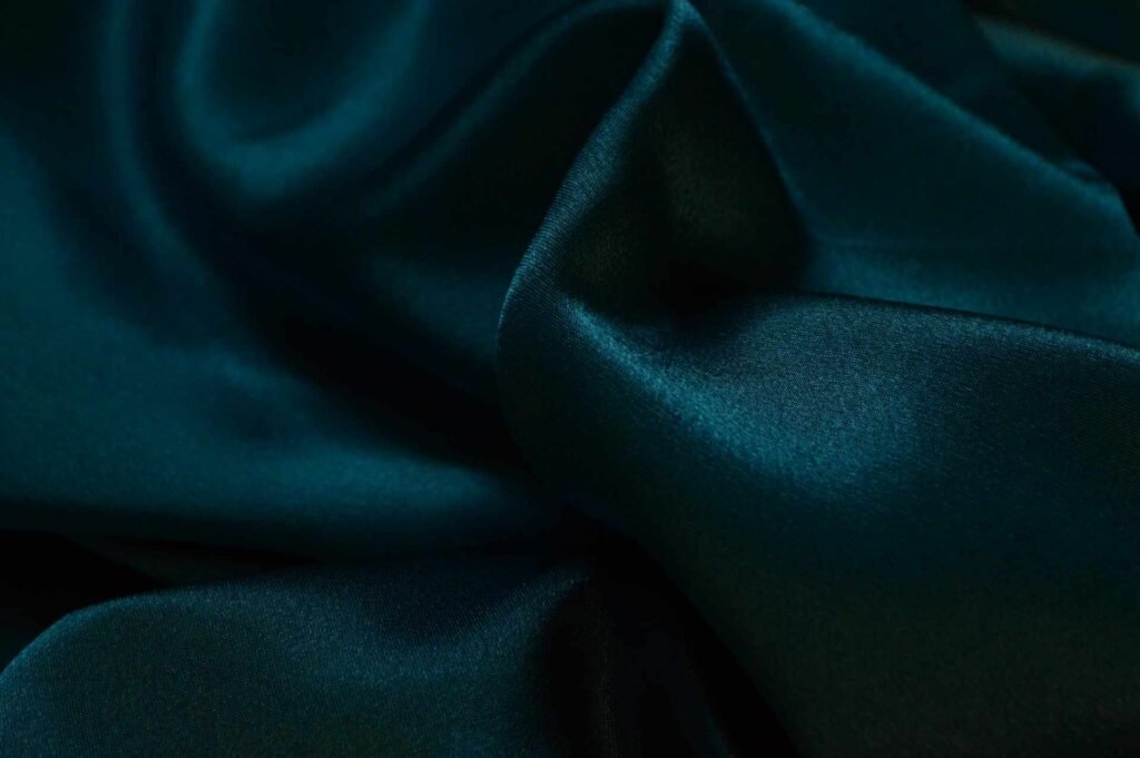 A dark blue velvet textile.