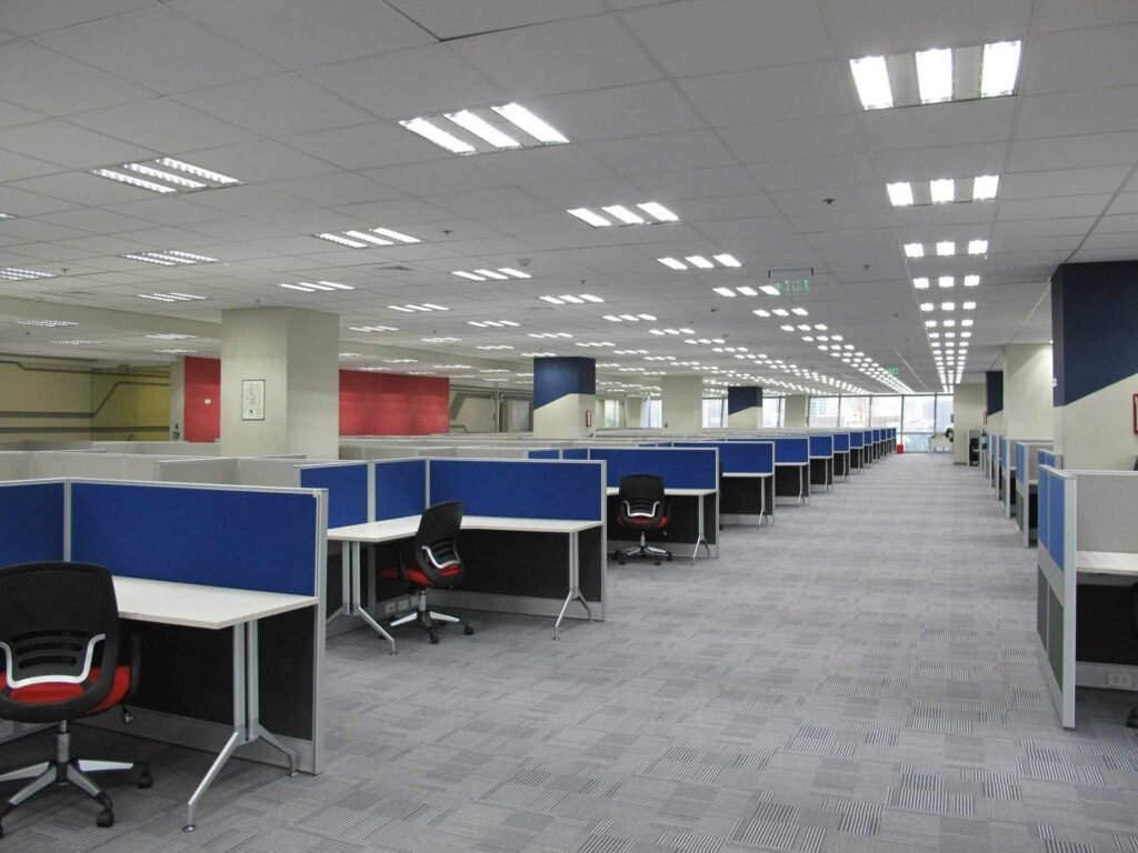 An empty open plan office space with a large echo.